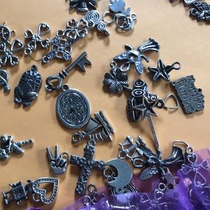 Bulk charms 1 pound aprox  400 random pieces